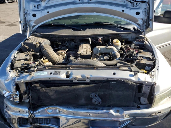 2001 Dodge 2500 z VIN 1B7KC23641J616324, wystawiony jako Copart lot #84152154 z przebiegiem 163 213 mil mil oraz Szkoda całkowita • Salvage title. Historia ofert i sprzedaży dostępna na DreamBid. Obrazek 11.