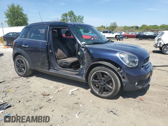 2015 MINI Countryman S with VIN WMWZC3C52FWT05882, listed as a Copart auction lot 54399525 with 125,971 mi miles and Salvage title. Bid and sale history available at DreamBid. Image 4.