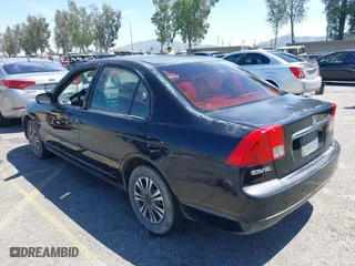2003 Honda Civic LX with VIN JHMES16523S000517, listed as a IAAI auction lot 42012871 with 158,253 mi miles. Bid and sale history available at carsss.com. Image 3.