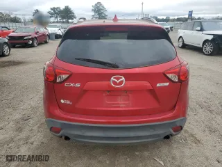 2016 Mazda CX-5 Grand Touring with VIN JM3KE2DY9G0678060, listed as a Copart auction lot 44690415 with 167,043 mi miles and Salvage Title. Bid and sale history available at carsss.com. Image 6.