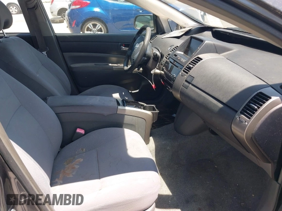 2007 Toyota Prius z VIN JTDKB20U173222332, wystawiony jako IAAI lot #42326043 z przebiegiem Nie podano mil oraz . Historia ofert i sprzedaży dostępna na DreamBid. Obrazek 5.