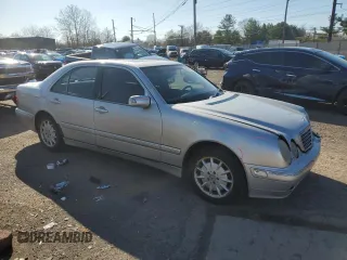 2002 Mercedes-Benz E-Class with VIN WDBJF82JX2X071254, listed as a Copart auction lot 50179635 with 126,870 mi miles and Salvage Title. Bid and sale history available at carsss.com. Image 4.