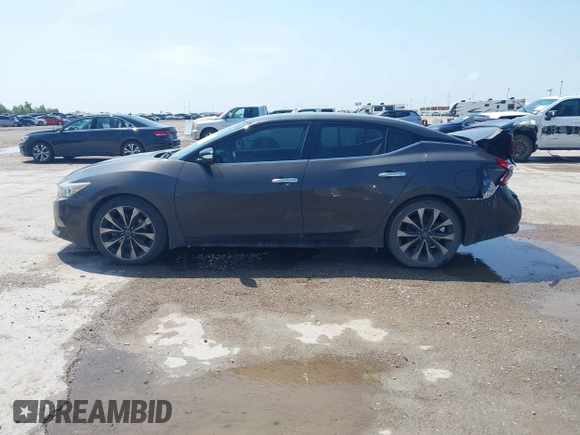 2016 Nissan Maxima SR z VIN 1N4AA6AP0GC400686, wystawiony jako IAAI lot #42378284 z przebiegiem 139 996 mil mil oraz . Historia ofert i sprzedaży dostępna na DreamBid. Obrazek 14.