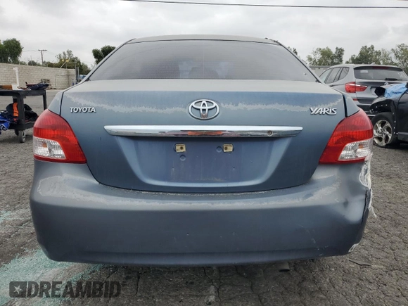 2010 Toyota Yaris with VIN JTDBT4K39A1393586, listed as a Copart auction lot 52240095 with 180,235 mi miles and Clean Title. Bid and sale history available at DreamBid. Image 6.