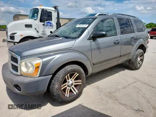 2005 Dodge Durango SXT с VIN 1D4HD38NX5F601092, выставлен на аукционе Copart как лот 63338515 с пробегом 301 984 миль миль и Чистый • Clean title. История ставок и продаж доступна на DreamBid. Изображение 1.