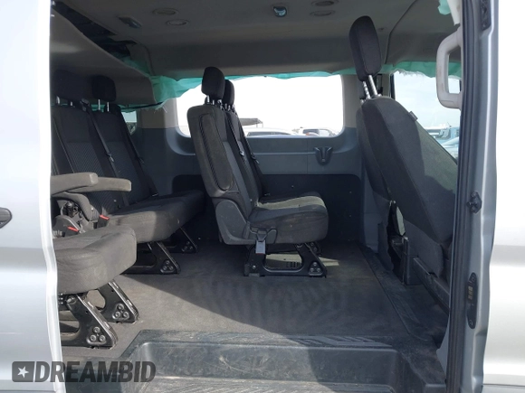 2015 Ford Transit XL z VIN 1FMZK1YMXFKA97523, wystawiony jako IAAI lot #40971108 z przebiegiem 253 712 mil mil oraz . Historia ofert i sprzedaży dostępna na DreamBid. Obrazek 8.