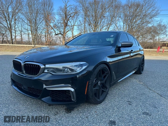 2018 BMW 5 Series M550i xDrive with VIN WBAJB9C55JB035226, listed as a Copart auction lot 60850325 with 156,183 mi miles and Clean title. Bid and sale history available at DreamBid. Image 1.