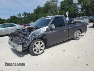 1996 Nissan Frontier XE z VIN 1N6SD11S0TC311270, wystawiony jako Copart lot #53870965 z przebiegiem 145 595 mil mil oraz Szkoda całkowita • Salvage title. Historia ofert i sprzedaży dostępna na DreamBid. Obrazek 1.