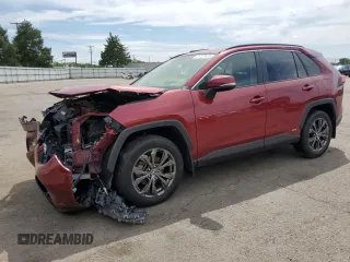 2023 Toyota RAV4 Hybrid XLE Premium z VIN JTMB6RFV0PD114887, wystawiony jako Copart lot #57337425 z przebiegiem 43 664 mil mil oraz Szkoda całkowita • Salvage title. Historia ofert i sprzedaży dostępna na DreamBid. Obrazek 1.