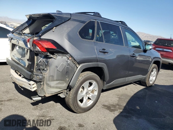 2020 Toyota RAV4 XLE with VIN 2T3W1RFV8LW070246, listed as a Copart auction lot 65072185 with 61,339 mi miles and Salvage title. Bid and sale history available at DreamBid. Image 3.