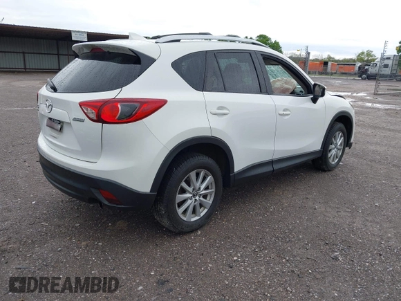 2016 Mazda CX-5 Touring with VIN JM3KE4CY0G0903723, listed as a IAAI auction lot 41966516 with 107,569 mi miles. Bid and sale history available at carsss.com. Image 4.