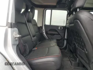 2023 Jeep Wrangler Rubicon with VIN 1C4JJXFM4PW589923, listed as a Copart auction lot 58725465 with 9,814 mi miles and Salvage title. Bid and sale history available at DreamBid. Image 11.