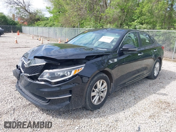 2016 Kia Optima LX with VIN 5XXGT4L32GG041760, listed as a IAAI auction lot 42175945 with 116,866 mi miles and . Bid and sale history available at carsss.com. Image 2.