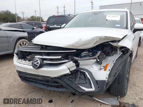 2023 Volkswagen Tiguan SE with VIN 3VVNB7AX8PM099759, listed as a IAAI auction lot 41340885 with 28,562 mi miles and . Bid and sale history available at DreamBid. Image 6.