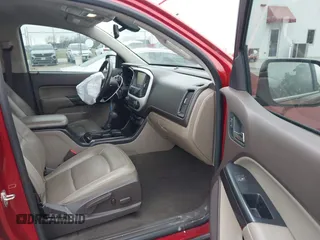 2015 GMC Canyon 2WD SLT with VIN 1GTG5CE3XF1211164, listed as a IAAI auction lot 41490387 with 163,932 mi miles. Bid and sale history available at carsss.com. Image 5.