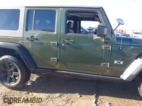 2008 Jeep Wrangler Unlimited X with VIN 1J8GA39118L594626, listed as a IAAI auction lot 41618878 with 166,071 mi miles and . Bid and sale history available at DreamBid. Image 13.