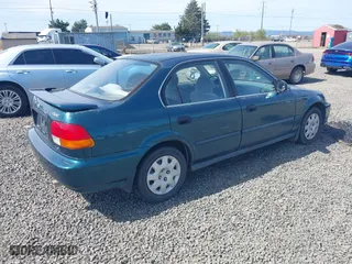 1998 Honda Civic LX with VIN 2HGEJ6678WH512055, listed as a IAAI auction lot 41944517 with 226,501 mi miles. Bid and sale history available at carsss.com. Image 4.