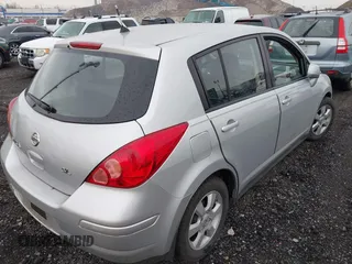 2008 Nissan Versa 1.8 S with VIN 3N1BC13EX8L369608, listed as a IAAI auction lot 42046943 with 133,826 mi miles. Bid and sale history available at carsss.com. Image 4.