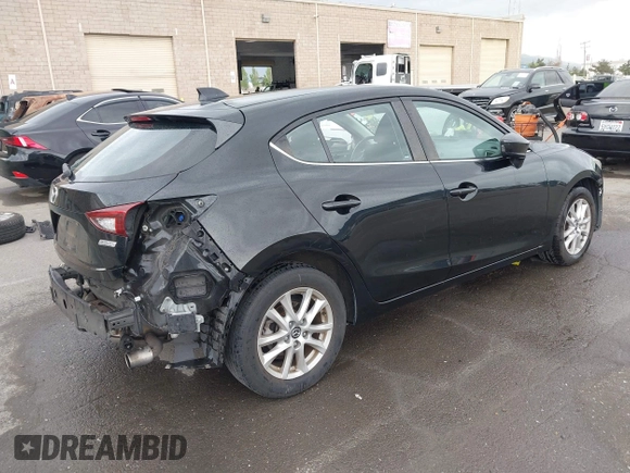 2014 Mazda 3 i Touring with VIN JM1BM1L73E1172987, listed as a IAAI auction lot 42111043 with 121,168 mi miles and . Bid and sale history available at DreamBid. Image 4.