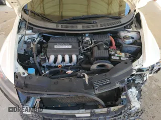 2013 Honda CR-Z z VIN JHMZF1D49DS000208, wystawiony jako Copart lot #68650024 z przebiegiem 183 724 mil mil oraz Szkoda całkowita • Salvage title. Historia ofert i sprzedaży dostępna na DreamBid. Obrazek 11.