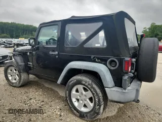 2016 Jeep Wrangler Willys Wheeler with VIN 1C4GJWAG6GL326498, listed as a Copart auction lot 62849715 with 49,414 mi miles and Salvage title. Bid and sale history available at DreamBid. Image 2.