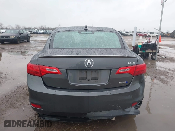 2014 Acura ILX Hybrid Technology z VIN 19VDE3F75EE300312, wystawiony jako IAAI lot #41608572 z przebiegiem 126 974 mil mil oraz . Historia ofert i sprzedaży dostępna na DreamBid. Obrazek 16.