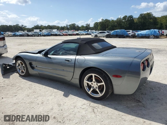 2004 Chevrolet Corvette with VIN 1G1YY32G945124387, listed as a Copart auction lot 77113234 with 59,985 mi miles and Salvage Title. Bid and sale history available at carsss.com. Image 2.