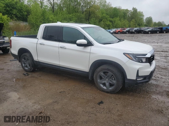2023 Honda Ridgeline RTL-E with VIN 5FPYK3F78PB015187, listed as a Copart auction lot 57655465 with 57,704 mi miles and Salvage title. Bid and sale history available at DreamBid. Image 4.