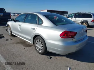 2014 Volkswagen Passat S w/Nav with VIN 1VWAP7A35EC052552, listed as a IAAI auction lot 41377109 with 123,273 mi miles. Bid and sale history available at carsss.com. Image 3.