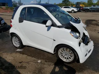 2011 Smart fortwo Pure with VIN WMEEJ3BA9BK474094, listed as a Copart auction lot 74012374 with 47,560 mi miles and Clean title. Bid and sale history available at DreamBid. Image 4.