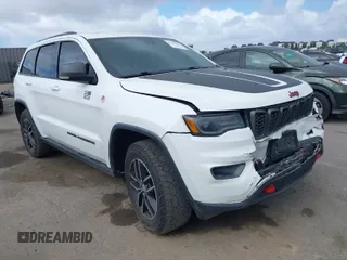 2018 Jeep Grand Cherokee Trailhawk with VIN 1C4RJFLT2JC137793, listed as a IAAI auction lot 41697299 with 149,100 mi miles. Bid and sale history available at carsss.com. Image 1.