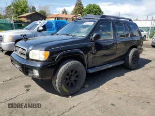 2004 Nissan Pathfinder SE with VIN JN8DR09Y94W902055, listed as a Copart auction lot 60122445 with 208,343 mi miles and Salvage title. Bid and sale history available at DreamBid. Image 1.