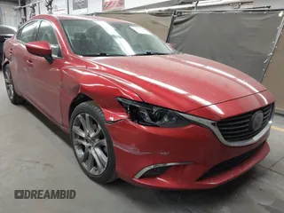 2016 Mazda 6 i Grand Touring с VIN JM1GJ1W50G1474054, выставлен на аукционе IAAI как лот 42162163 с пробегом 97 169 миль миль и . История ставок и продаж доступна на DreamBid. Изображение 1.