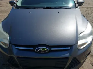 2014 Ford Focus SE with VIN 1FADP3F29EL114761, listed as a IAAI auction lot 41892708 with 175,085 mi miles. Bid and sale history available at carsss.com. Image 6.