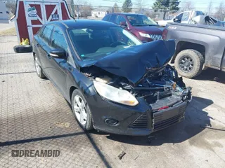 2014 Ford Focus SE with VIN 1FADP3F22EL207587, listed as a IAAI auction lot 41818555 with 119,811 mi miles. Bid and sale history available at carsss.com. Image 1.