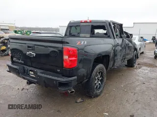 2018 Chevrolet Silverado 1500 LT with VIN 3GCUKREC7JG497399, listed as a IAAI auction lot 41497685 with 179,811 mi miles. Bid and sale history available at carsss.com. Image 4.