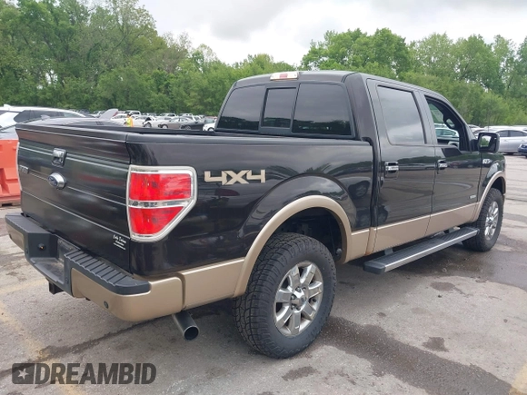 2014 Ford F-150 XL with VIN 1FTFW1ET5EKE83868, listed as a IAAI auction lot 42159157 with 173,606 mi miles. Bid and sale history available at carsss.com. Image 4.