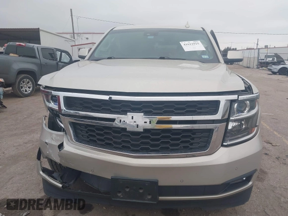 2015 Chevrolet Suburban LT with VIN 1GNSCJKC4FR744208, listed as a IAAI auction lot 41612915 with 87,445 mi miles and . Bid and sale history available at DreamBid. Image 12.