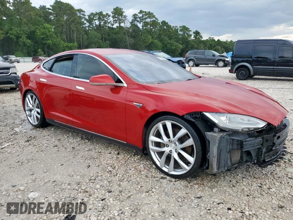 2014 Tesla Model S 60 with VIN 5YJSA1H11EFP43669, listed as a Copart auction lot 62368605 with Not provided miles and Salvage title. Bid and sale history available at DreamBid. Image 4.