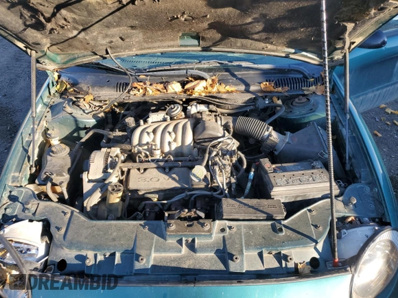 1997 Ford Taurus G with VIN 1FALP51U4VG297298, listed as a Copart auction lot 79660284 with 115,038 mi miles and Clean Title. Bid and sale history available at carsss.com. Image 13.