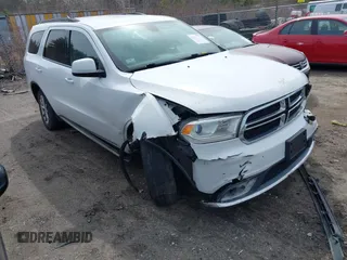 2014 Dodge Durango SXT z VIN 1C4RDJAG3EC323428, wystawiony jako IAAI lot #41893731 z przebiegiem 152 129 mil mil oraz . Historia ofert i sprzedaży dostępna na DreamBid. Obrazek 1.