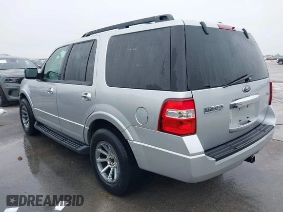 2014 Ford Expedition XLT with VIN 1FMJU1H52EEF01900, listed as a IAAI auction lot 42106404 with 149,992 mi miles and . Bid and sale history available at DreamBid. Image 3.