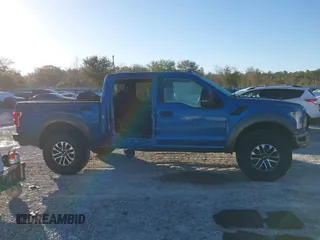 2020 Ford F-150 Raptor with VIN 1FTFW1RG6LFA91517, listed as a IAAI auction lot 41800990 with 112,535 mi miles and . Bid and sale history available at carsss.com. Image 14.