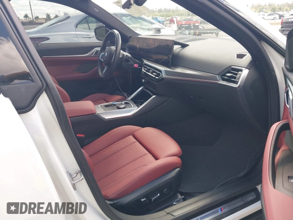 2024 BMW i4 eDrive35 z VIN WBY43AW02RFS79370, wystawiony jako IAAI lot #41887964 z przebiegiem 11 910 mil mil oraz . Historia ofert i sprzedaży dostępna na DreamBid. Obrazek 5.
