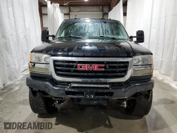 2003 GMC Sierra 2500HD SLT z VIN 1GTHK23103F107158, wystawiony jako Copart lot #50429915 z przebiegiem Nie podano mil oraz Szkoda całkowita • Salvage title. Historia ofert i sprzedaży dostępna na DreamBid. Obrazek 5.
