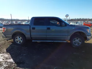 2014 Ford F-150 XL with VIN 1FTFW1EF7EKD93048, listed as a IAAI auction lot 41443576 with 167,124 mi miles. Bid and sale history available at carsss.com. Image 13.
