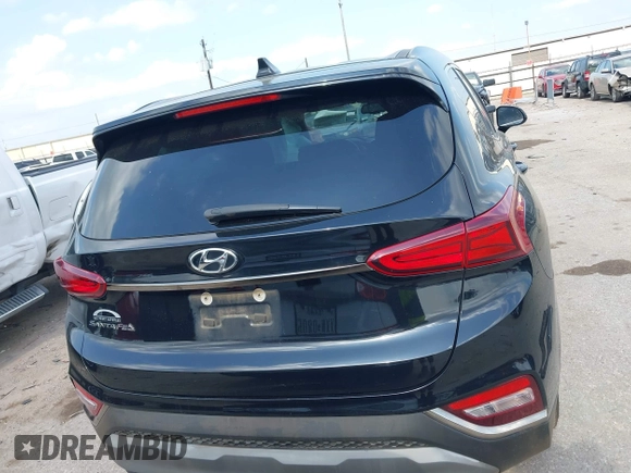 2019 Hyundai Santa Fe SEL z VIN 5NMS33AD8KH006327, wystawiony jako IAAI lot #42134349 z przebiegiem 133 961 mil mil oraz . Historia ofert i sprzedaży dostępna na DreamBid. Obrazek 16.