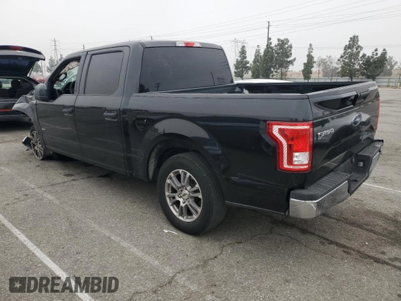 2015 Ford F-150 XL with VIN 1FTEW1CG0FKD03070, listed as a Copart auction lot 52990475 with 102,844 mi miles and Salvage title. Bid and sale history available at DreamBid. Image 2.