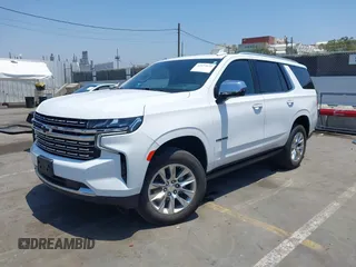 2023 Chevrolet Tahoe Premier with VIN 1GNSKSKD0PR262516, listed as a IAAI auction lot 42473875 with 83,461 mi miles and . Bid and sale history available at DreamBid. Image 2.