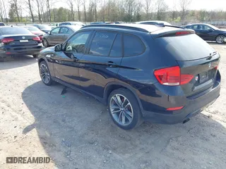 2014 BMW X1 sDrive28i with VIN WBAVM1C51EVW51040, listed as a IAAI auction lot 41956856 with 1 mi miles. Bid and sale history available at carsss.com. Image 3.
